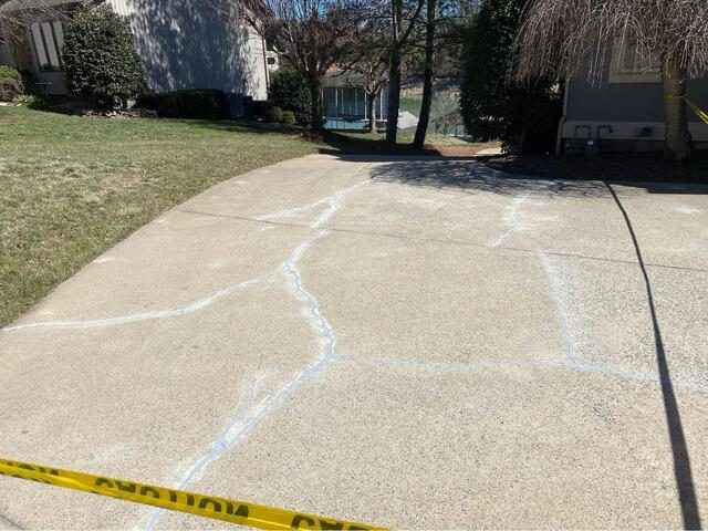 After photo of sealed concrete driveway crack