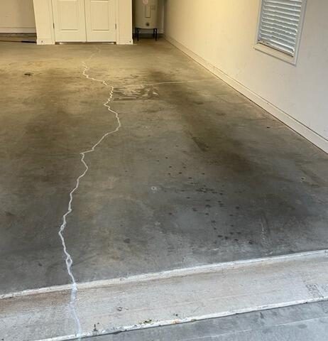 After sealed concrete crack in garage floor