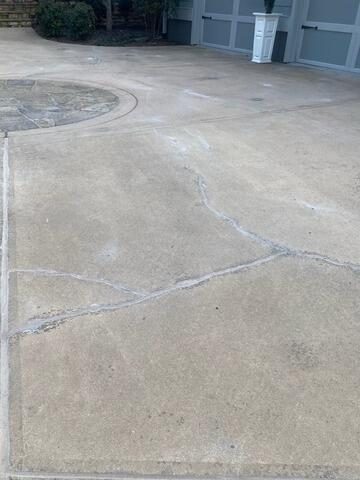 After photo of sealed driveway concrete crack